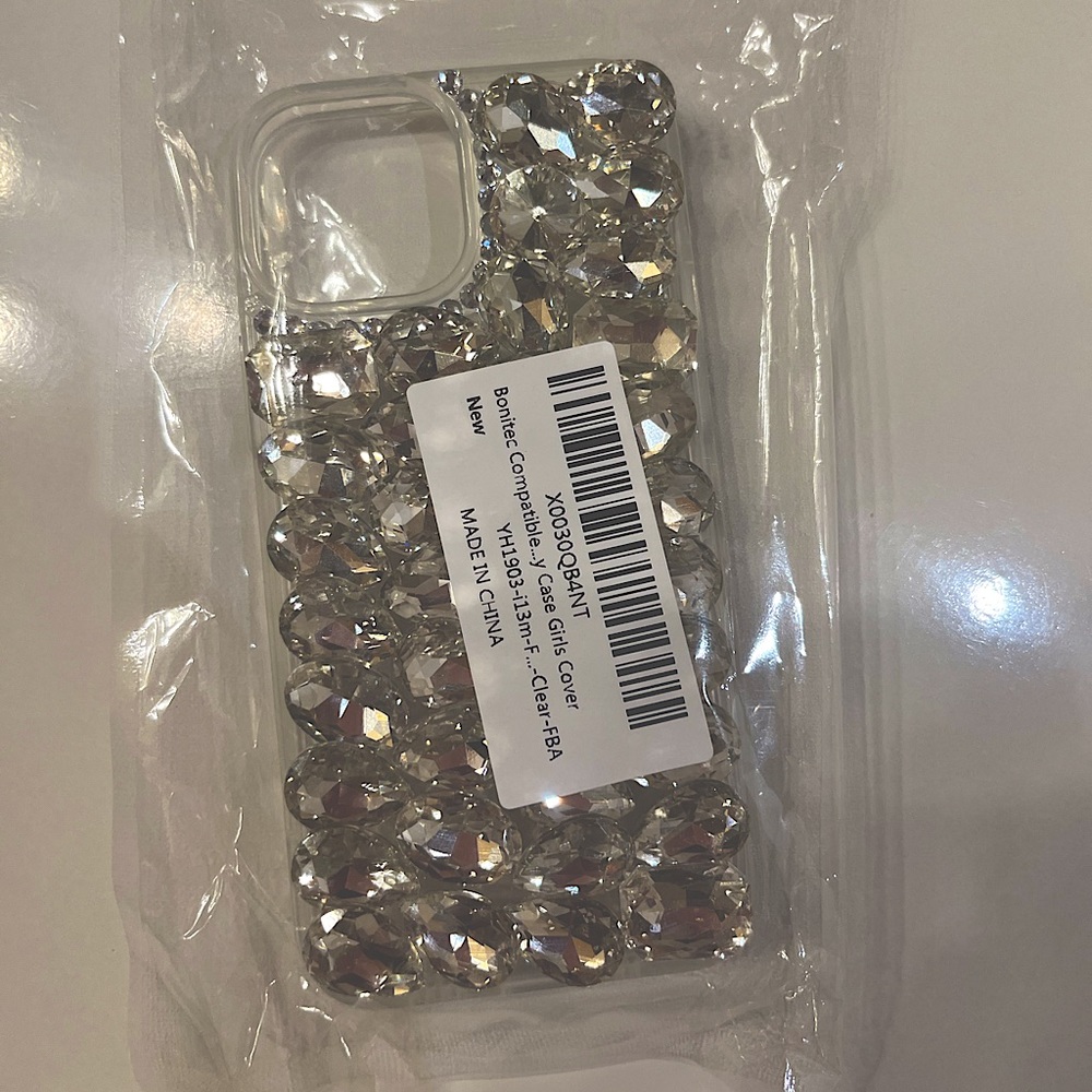 Brand new in package. Gorgeous iPhone 13 mini cover